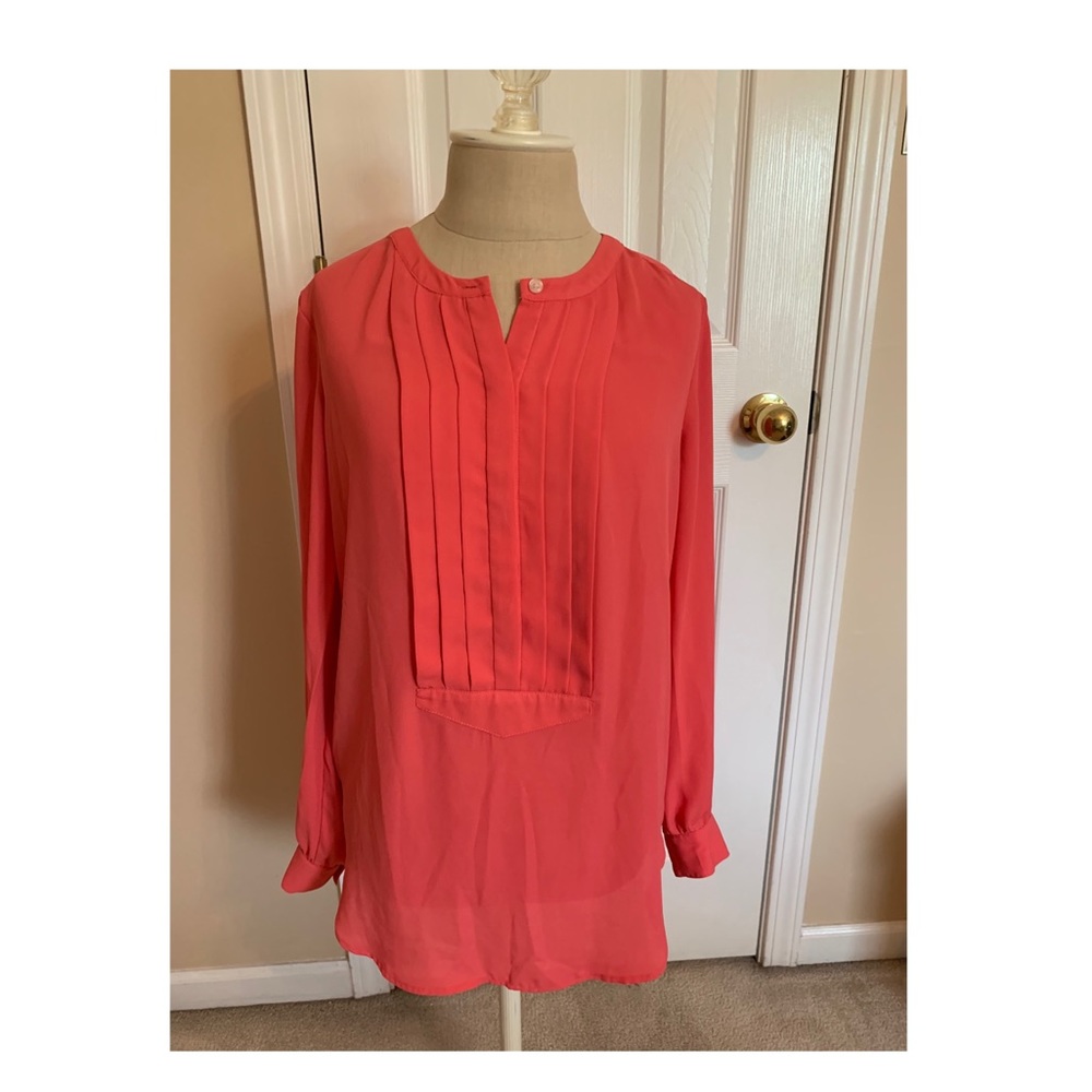 Coral colored blouse